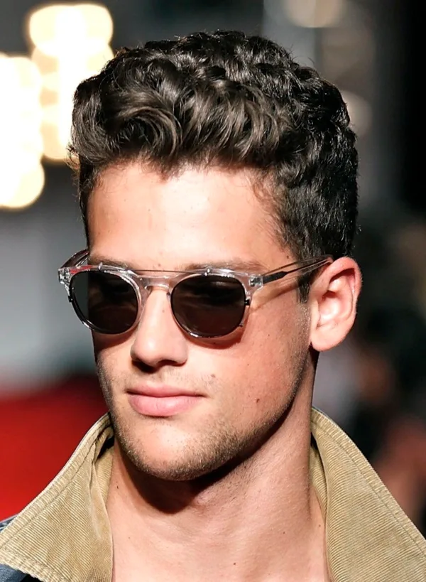 A model walks the runway at the Michael Bastian Men's Spring 2012 fashion show during Mercedes-Benz Fashion Week at Exit Art on September 12, 2011 in New York City.
