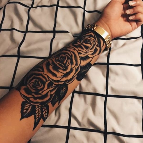 Brilliant Coverup Tattoos Combine Blackout Ink with Blossoms