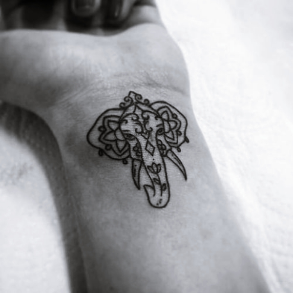 25 Good Luck Tattoo Symbols with Meaning Behind Them